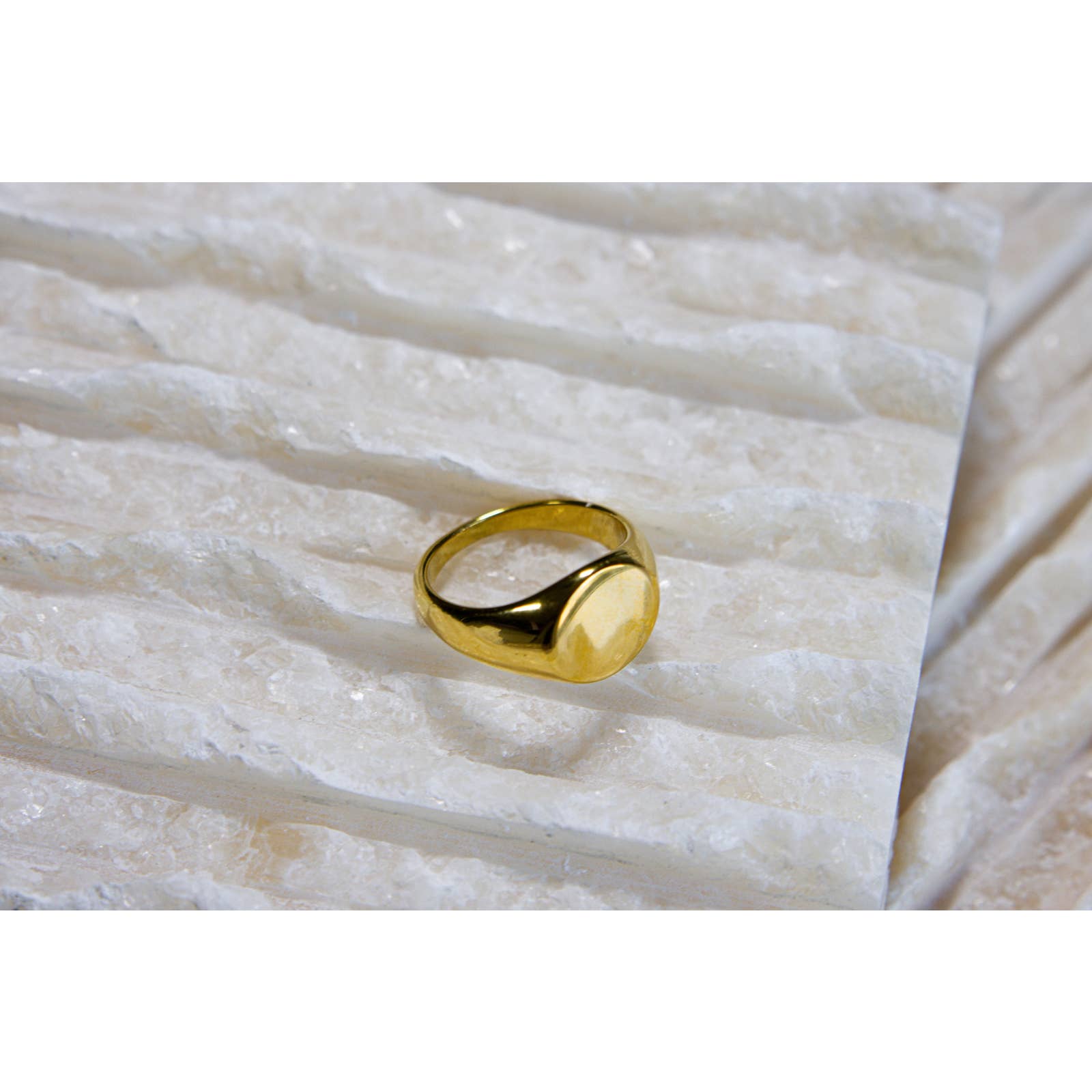 Gold-toned signet ring photographed for a marketplace product listing